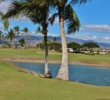 Palm trees, water and trade winds are what defend Hawaii Prince Golf Club. 